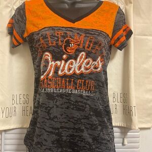 Touch small Baltimore Orioles blouse.